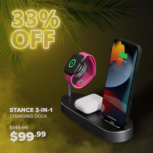 Phone charging stand by a window with a smartphone placed vertically.