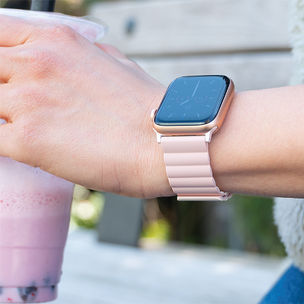 Close-up of a smartwatch on a wrist during everyday use.